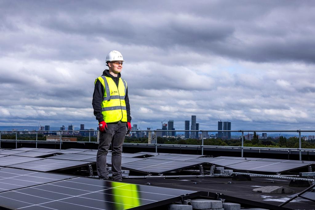 Wide view of renewable energy installations with sunrise