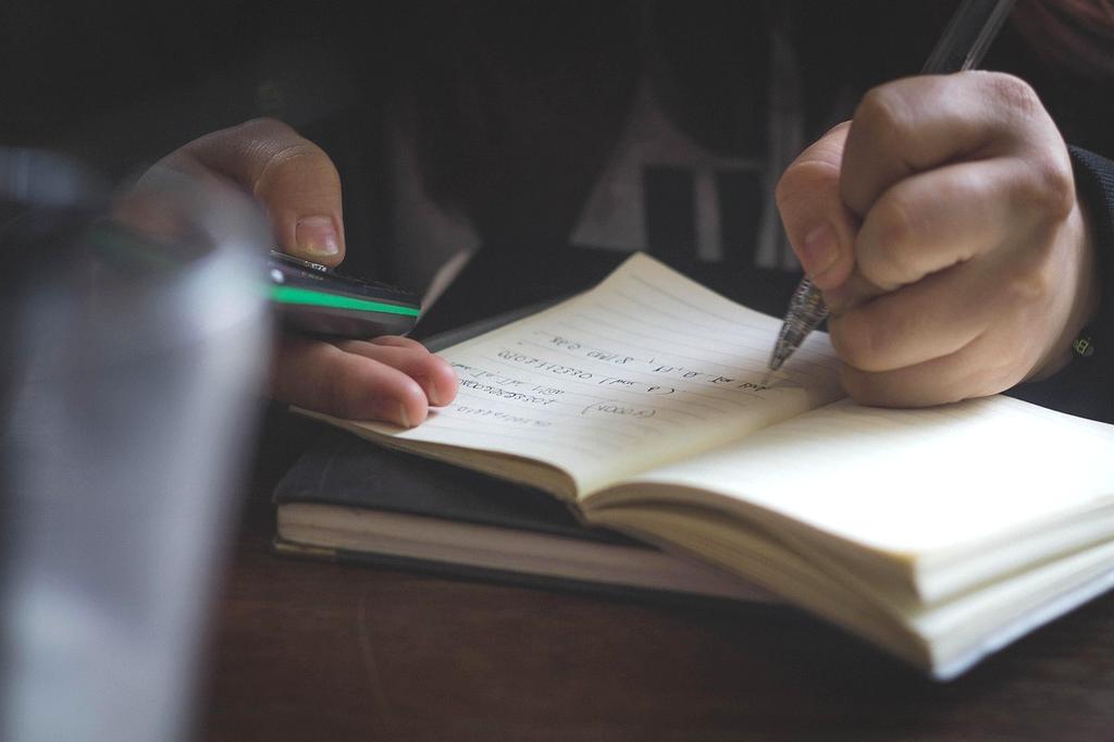 Student interacting with multiple learning devices